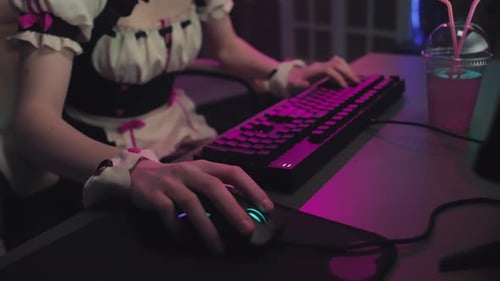 Young Adult Gaming at Neon-Lit Computer Desk