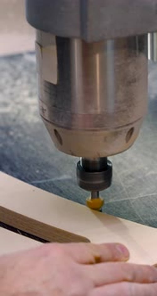 Automated Machine Cutting Wood in Workshop, Close Up
