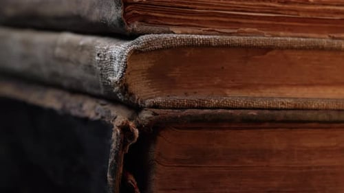 Stack of Old Vintage Books with Worn Brown Pages