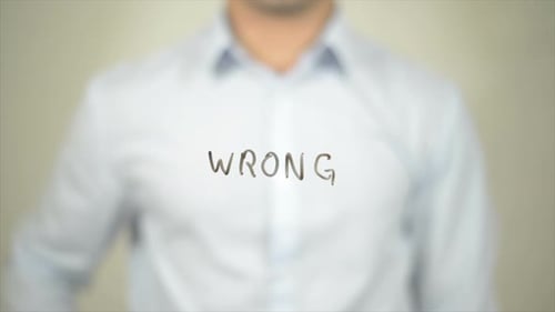 Wrong, Man Writing on Transparent Screen