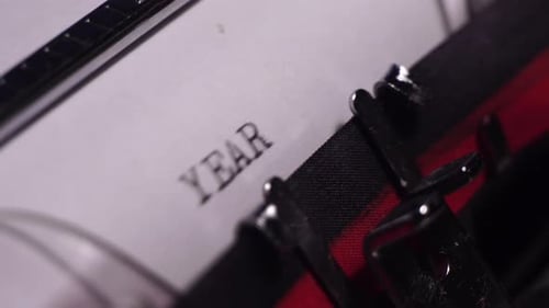 Year 1973, Typing on Blank White Paper in Vintage Typewriter, Close Up