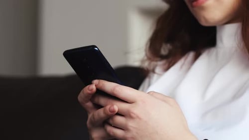 Close Up of Caucasian Female Hands Holding Smartphone Happy Female Enjoy Online Chat Internet