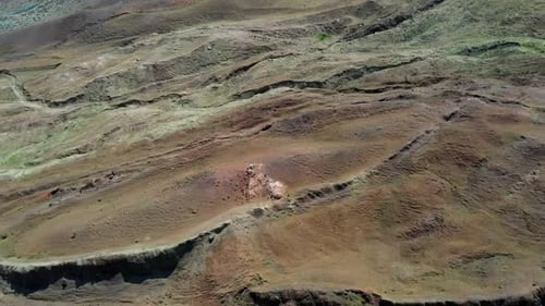 Aerial View of Arid Hills and Mountains