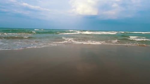 Ocean waves on cloudy day