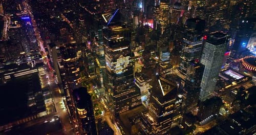 Impressive diverse architecture of vibrant New York. Beautifully shining metropolis at night.