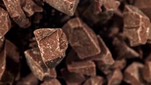 Chunks of Chocolate Falling in Slow Motion