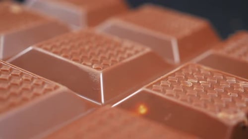Dark Chocolate on a Plate on Table Close Up