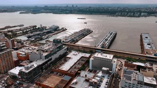 Parking lots of New York from aerial view. Car parks on the roofs of the building and piers.