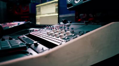 Mixing Board in Dark Recording Studio, Close Up