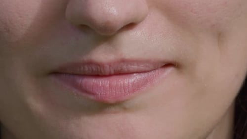 Close Up of Smiling Pink Lips and Teeth