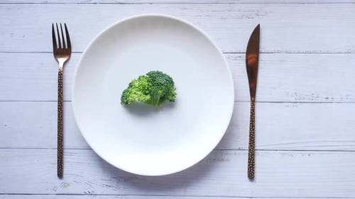 Top View of Broccoli in Plate on Table
