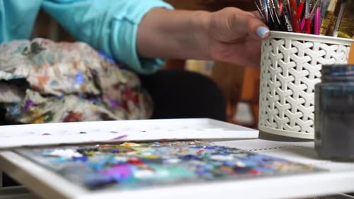 Expressive Painting: Adult Female Artist in Creative Studio.