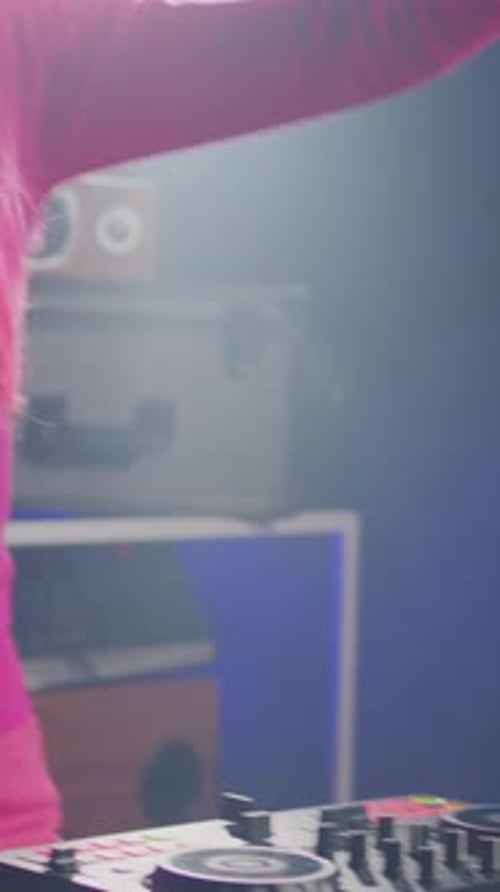 Vertical Video Smiling Dj Performing Electronic Music at Party in Nightclub