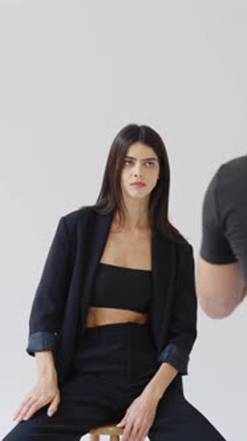 Fashionable Woman Posing in Studio, Vertical Format
