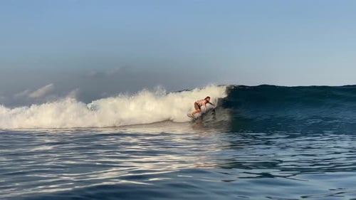 Surfer Riding in the Indian Ocean