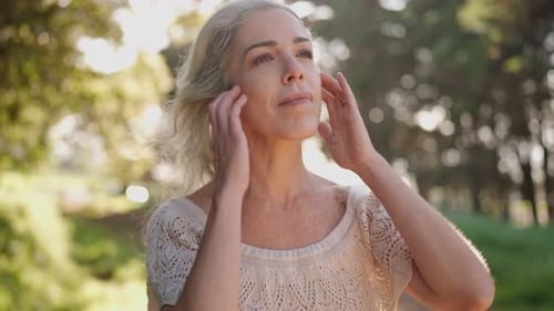 Woman Enjoys Sunny Day in Nature