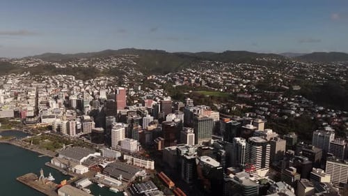 Famous port of Wellington in New Zealand st sunny day. City with houses and neighborhood on island.