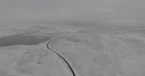 aerial view road in snowy landscape