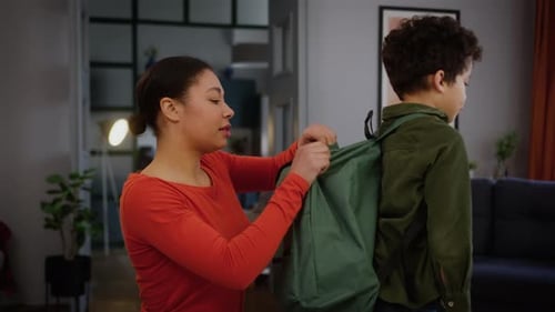 Woman Packing Lunch for Child's School Day