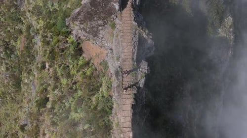 Hikers Walking On Scenic Mountain Path In Madeira Top Down View