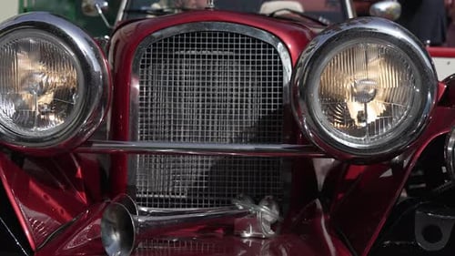 Old Vintage Car Muscle American Auto Front Bumper Headlight and Grill Red Convertible Cabriolet