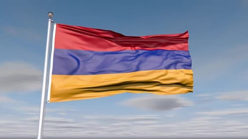 Armenian Flag Waving on Flagpole with Blue Sky