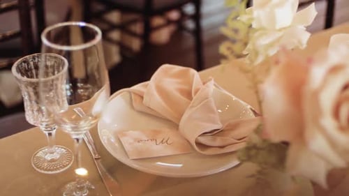 Elegant Wedding Table Setting with Floral Decor