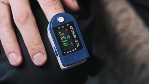 Pulse Oximeter Measuring Oxygen on Finger