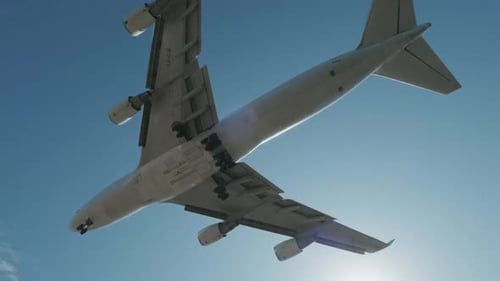 Airplane Approaching Runway on Sunny Day