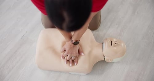 CPR Training with Hands on Dummy