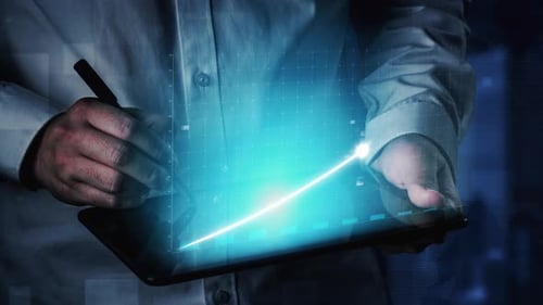 Man Using Tablet for Business Data Analysis