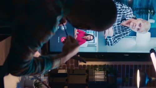 People Having an Online Video Call in the Evening
