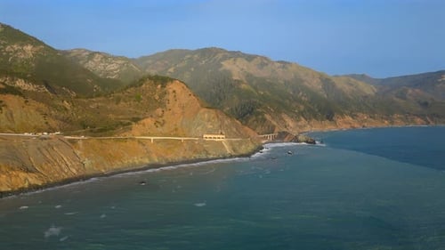 Experience the Stunning Aerial Views of Big Sur a Stunning Coastal Area Along Highway 1 at Sunset