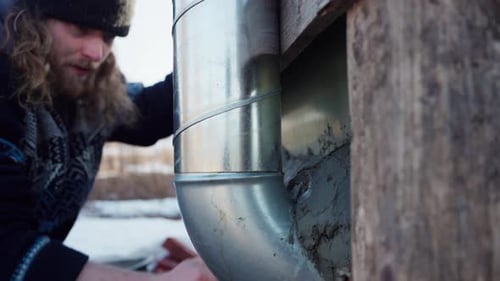 Guy Spreading Mortar On The Brick Wall Of Hot Tub. - close up shot