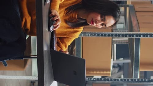 Vertical Video Asian Woman with Disability Working in Warehouse