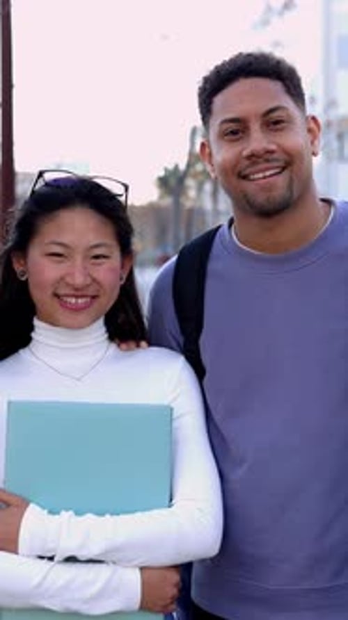 Multiracial Group of United College Student Friends Smiling at Camera Outdoors