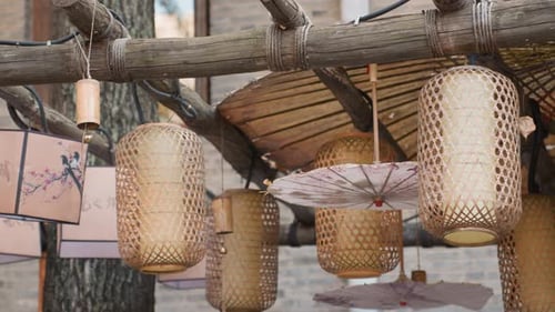 Artisan Display Featuring Paper Umbrellas and Woven Shades at Market Festival Atmosphere with