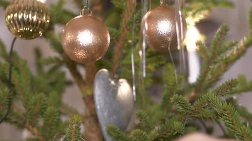 Decorated Christmas Tree with Silver and Gold Baubles