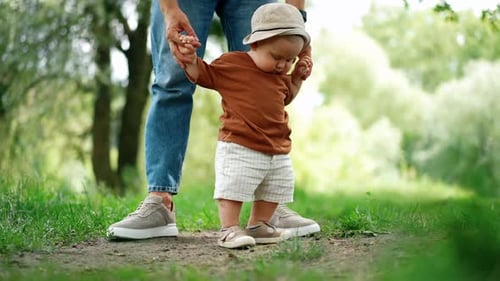 Infant Learning to Walk with Parental Support Outdoors