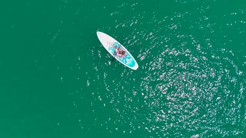 Aerial View Exploring the Large Green Canyon on Paddleboards People Enjoy a Relaxing Summer Day