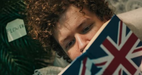 Eyes of a Teenager Reading an English Dictionary Textbook
