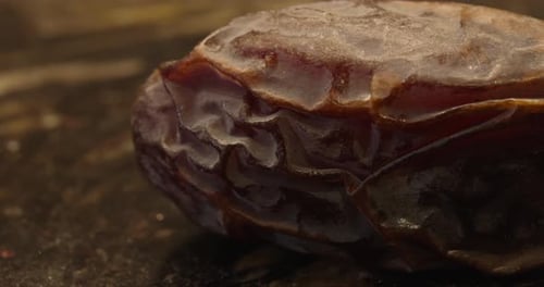 a dried plum filmed