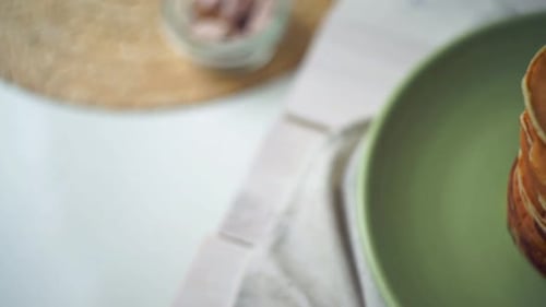 American pancake stack on green plate ready for sweet breakfast treat