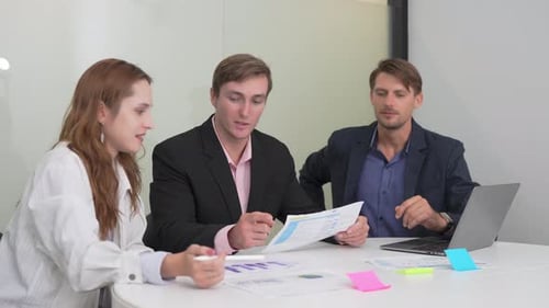 Meeting, documents and business people in office for report for planning, finance review or analysis