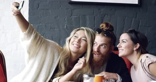 4k video footage of a group of friends catching up at a cafe together