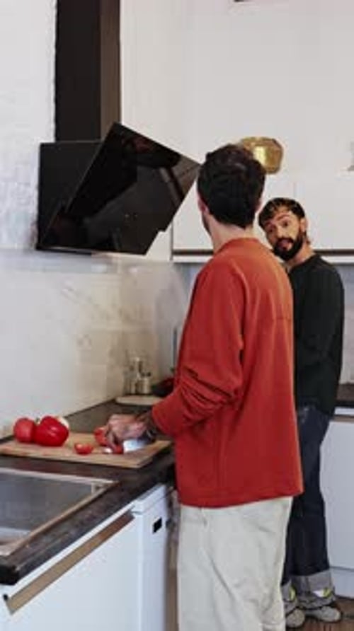 Two Men Preparing Food in Modern Kitchen