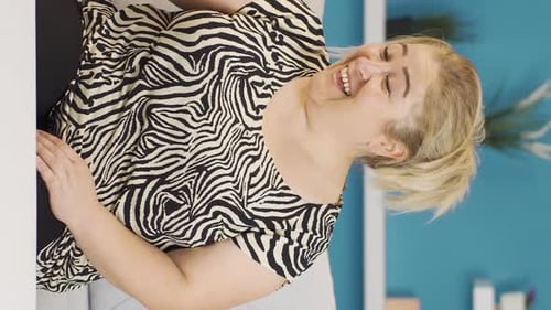 Vertical video of The woman who reads the good news.