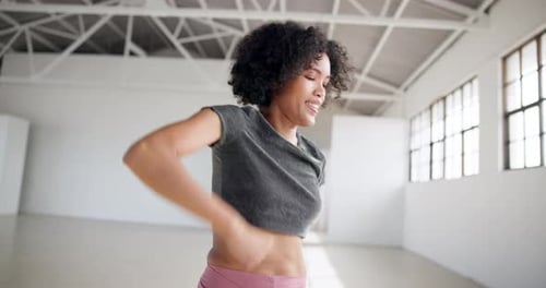 Dance, energy and art with a woman in a studio for fitness, wellness or training for performance