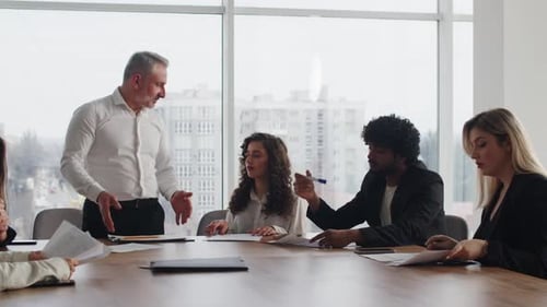 Business Team Meeting in Modern Office Space