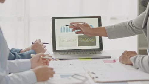 Close up of business hands are working and brainstorming on paperworks.